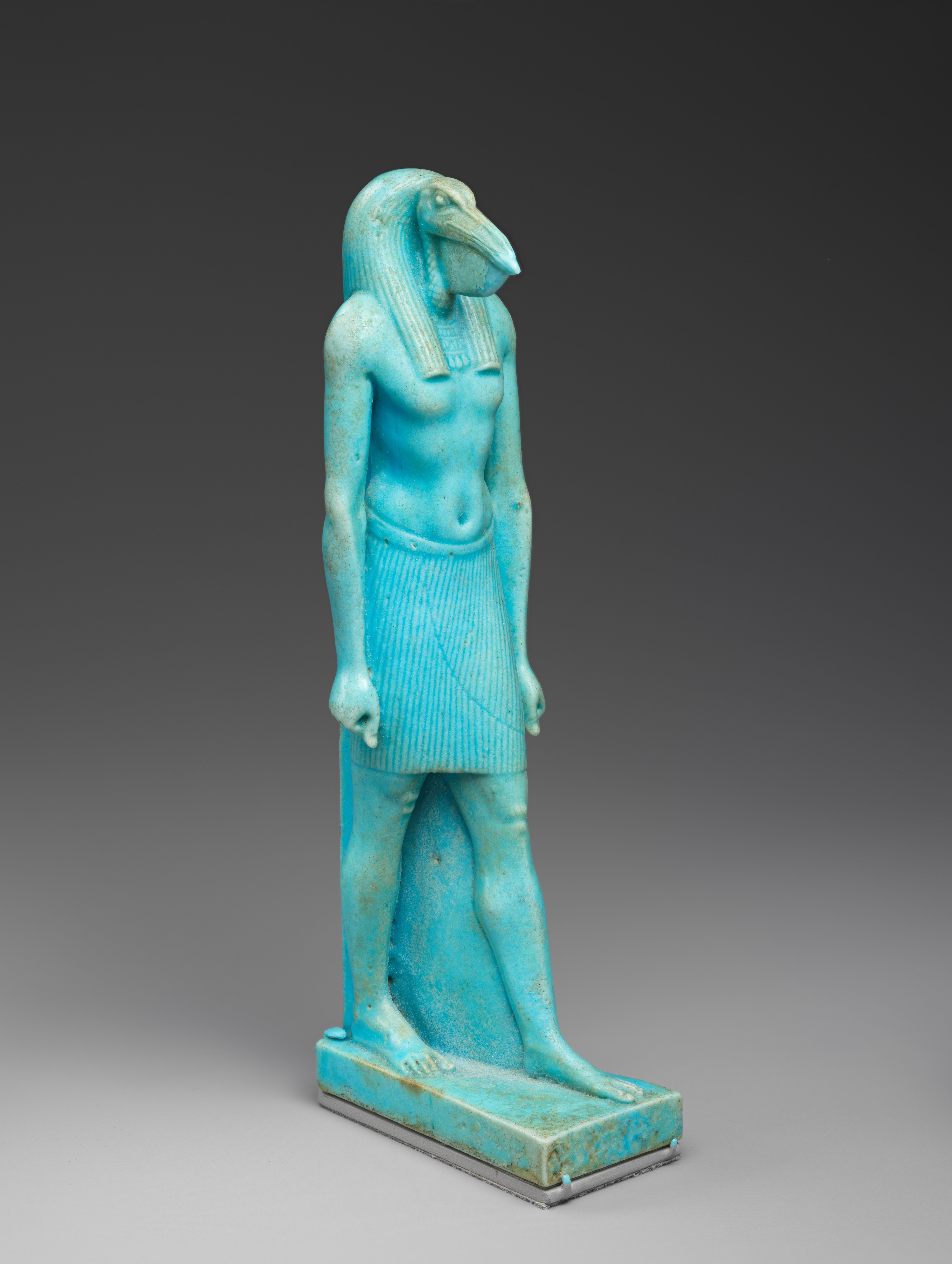 Estátua egípcia de Thoth caminhando, acervo do Metropolitan Museum of Art